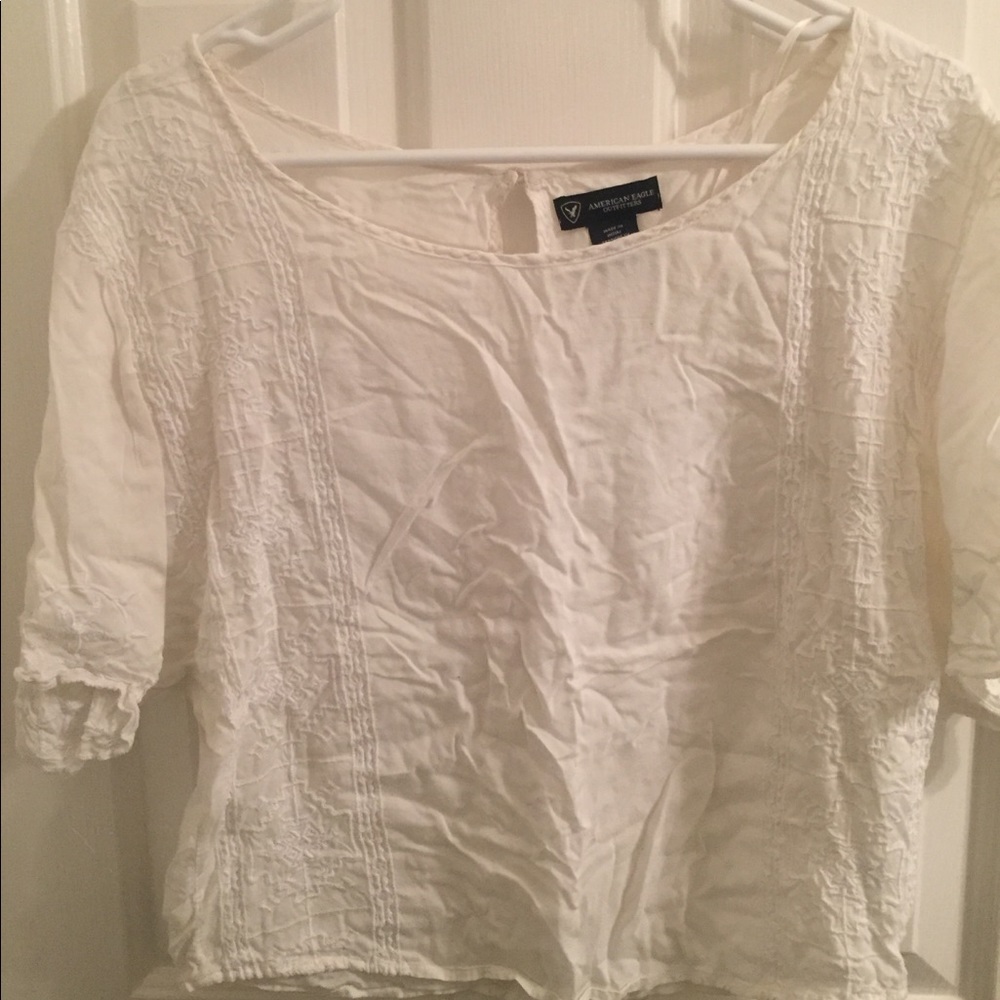 Short sleeve cream colored loose fitting top